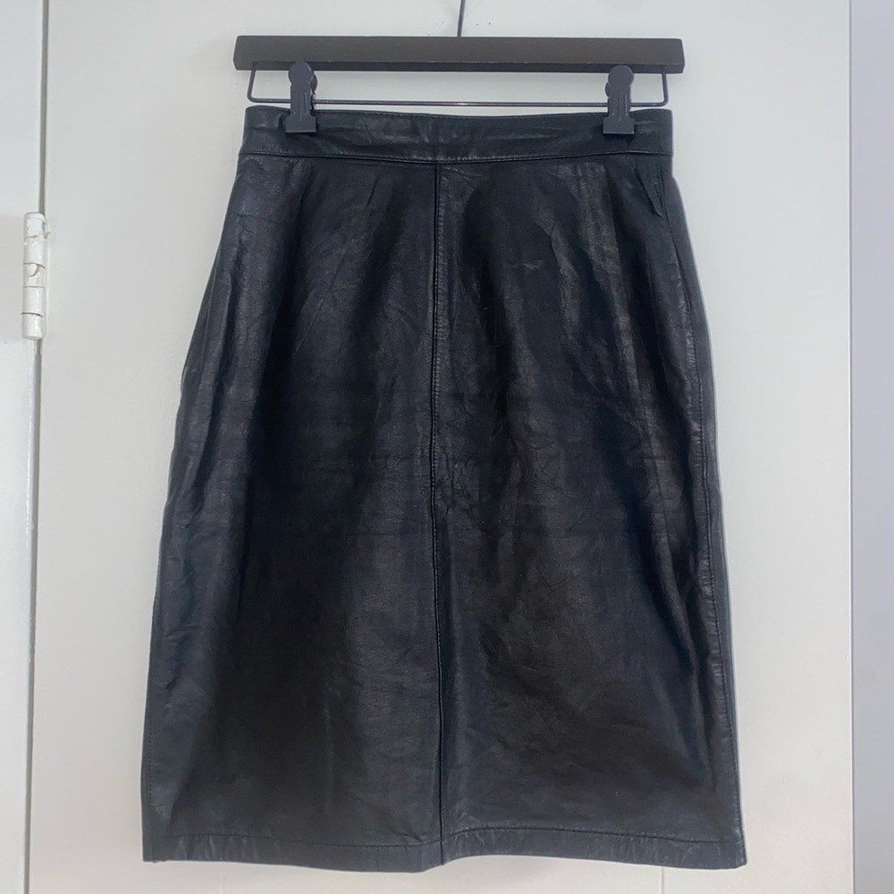 Black knee length leather skirt